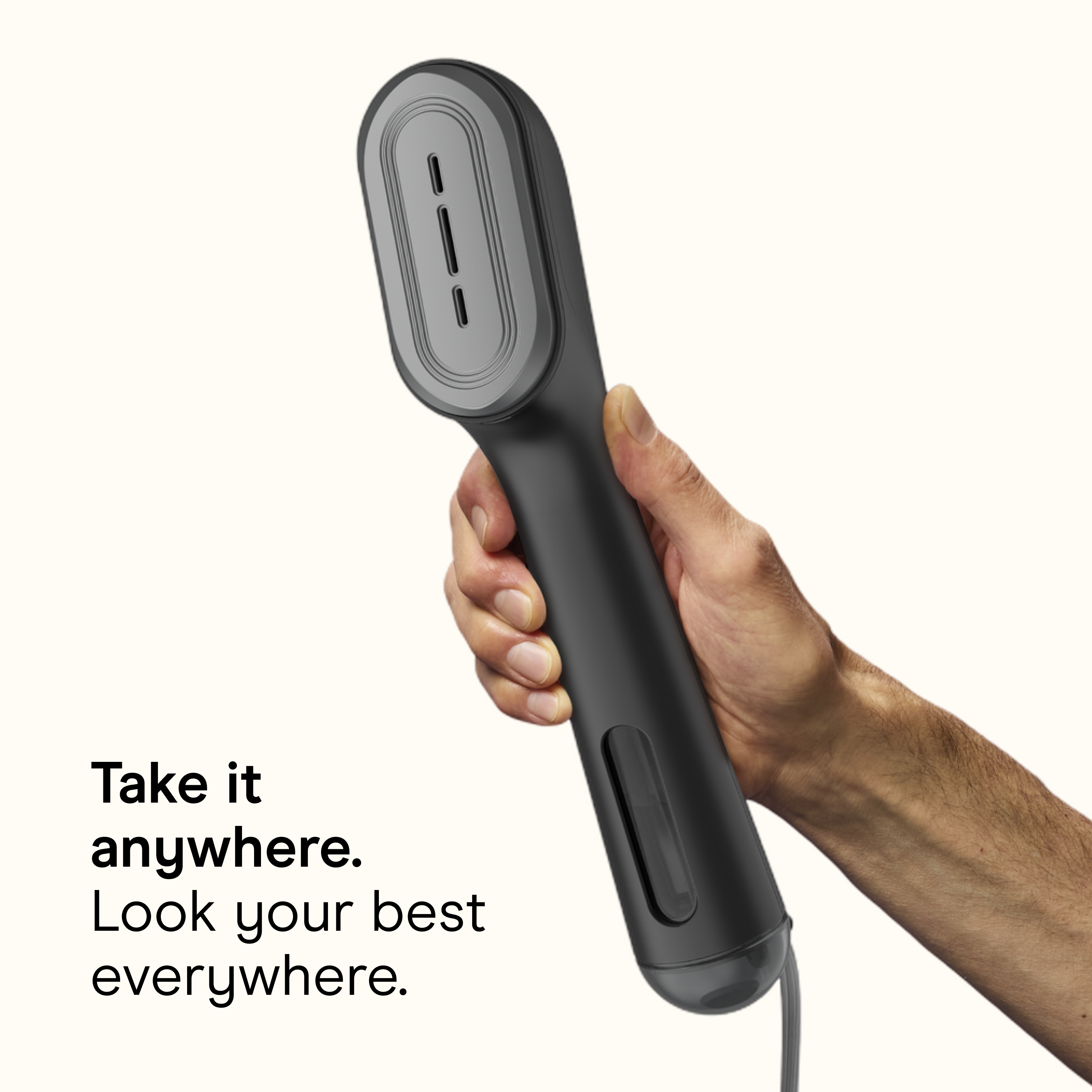 Conair GS47 handheld steamer in black, 'Take it anywhere' hero